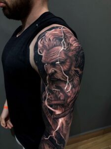 tattoo realista braco masculina ribeirao preto
